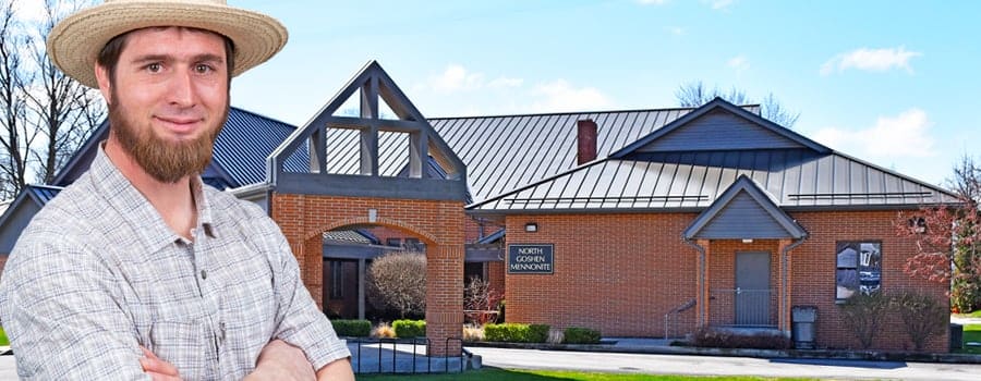 Nelson-Stump-in-front-of-North-Goshen-Menonite-Church-Stump-Metal-Roof.jpg